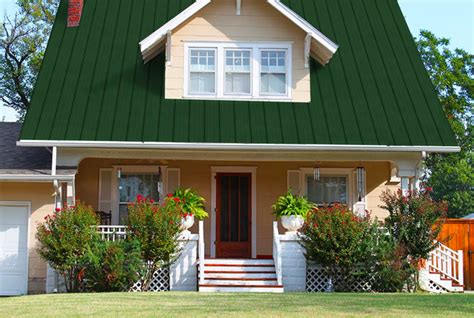 pics of houses painted green with metal green roof|matching paint to green roof.